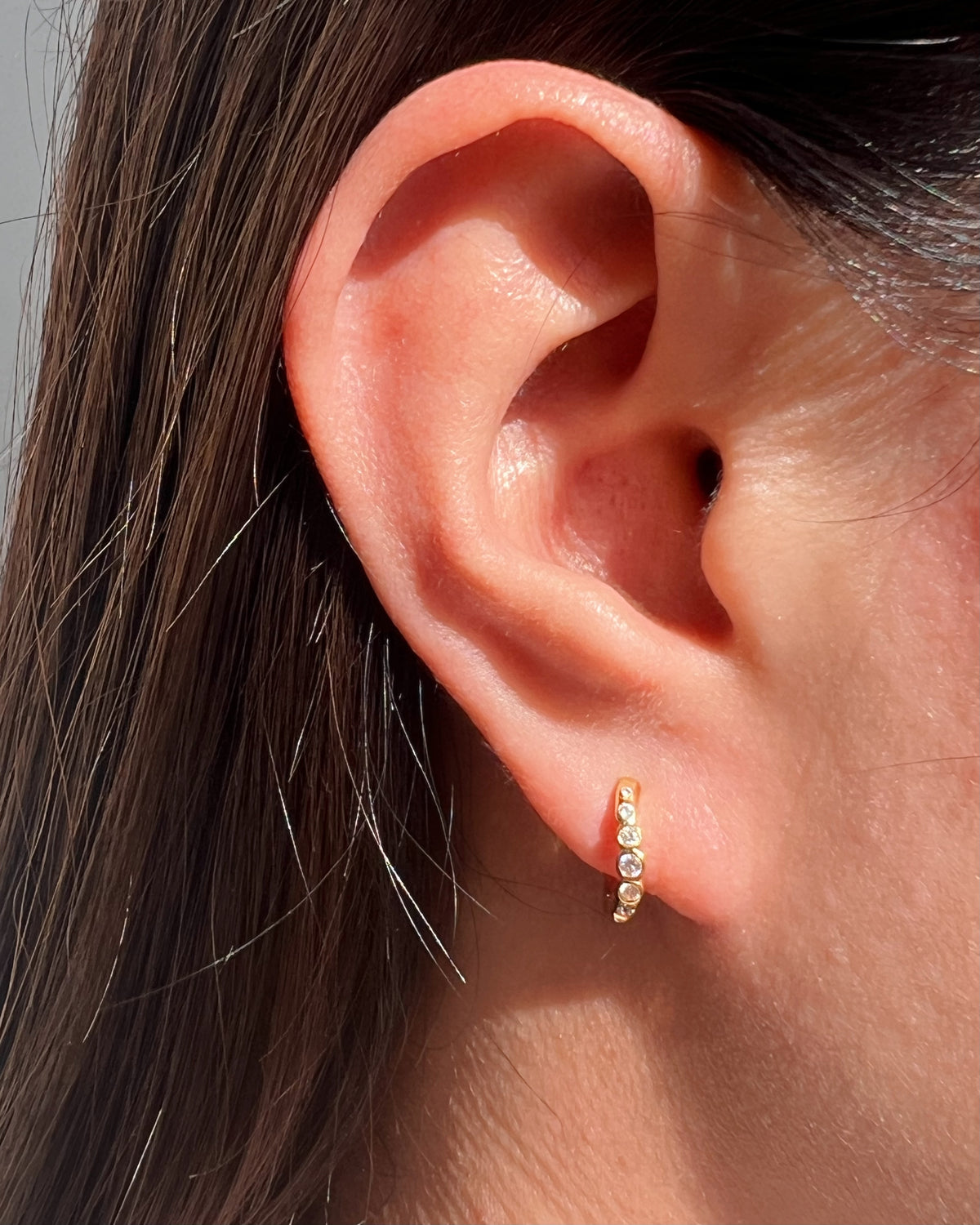 Veronica Wave Design Zircon Paved Huggie Hoop Earrings