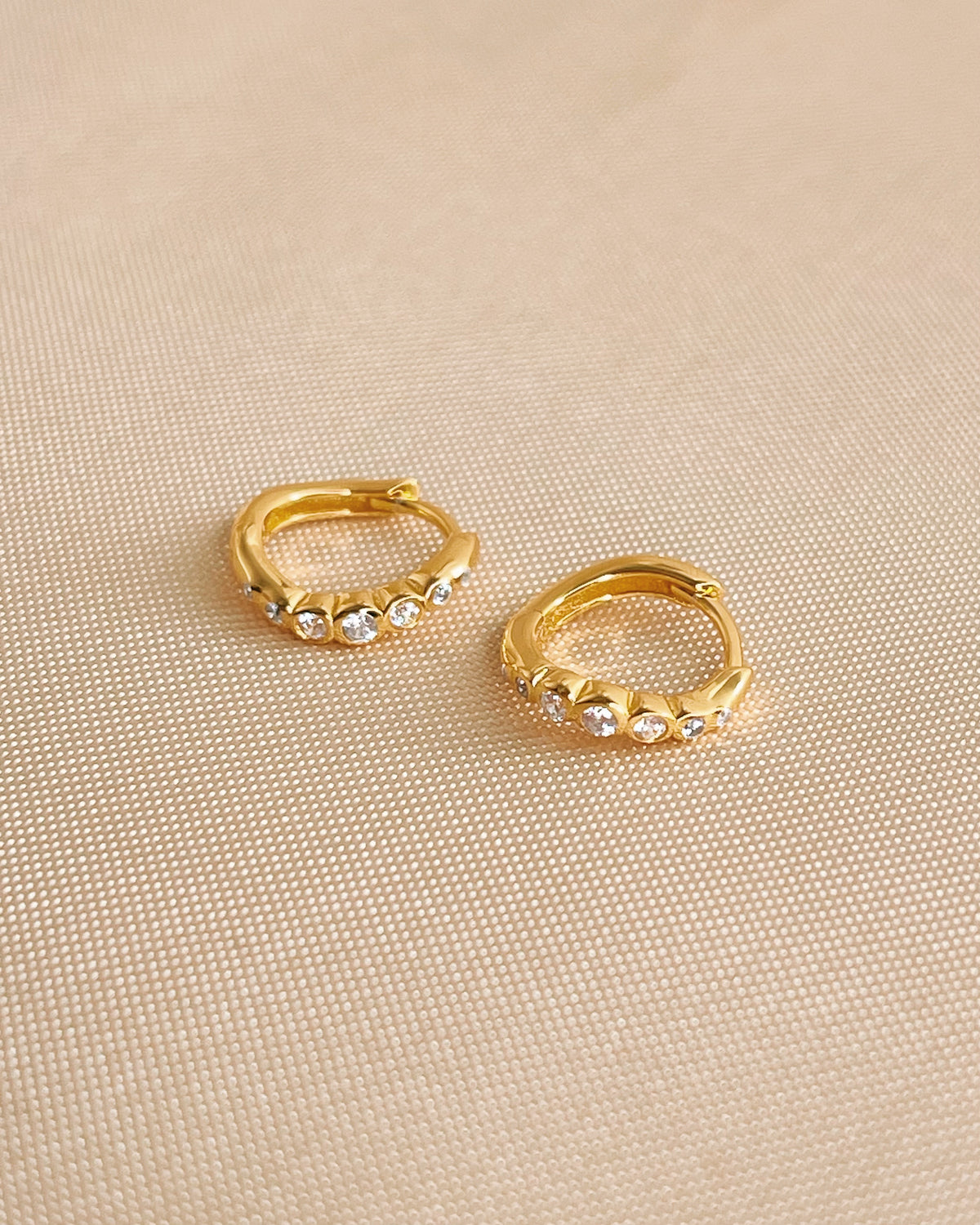 Veronica Wave Design Zircon Paved Huggie Hoop Earrings